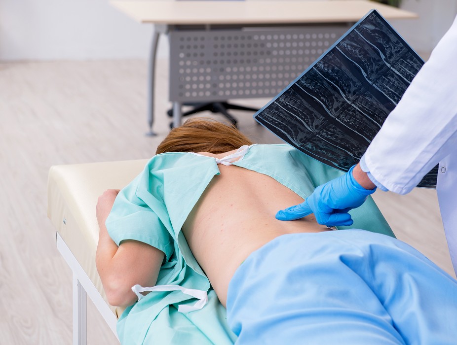 Patient receiving minimally invasive spine procedures treatment