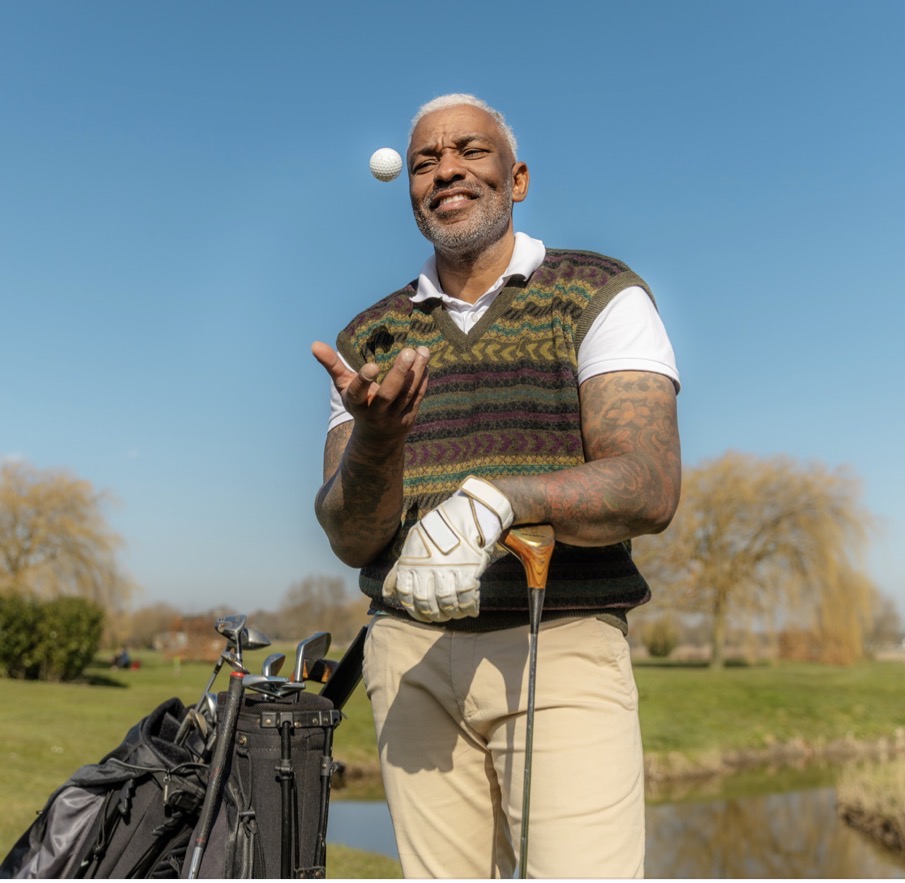 Active man golfing